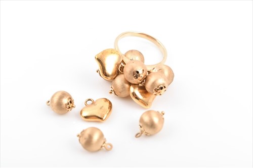 Lot 593 - An unusual 14k yellow gold cocktail ring with...
