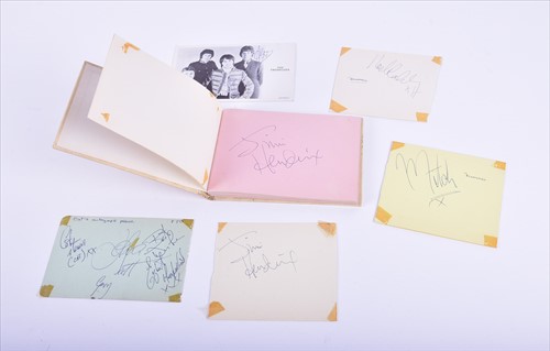 Lot 329 - Jimi Hendrix: an autograph book containing two...