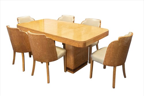 Lot 122 - An Art Deco bird's-eye maple veneer dining...