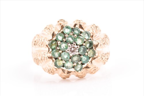 Lot 627 - A 9ct yellow gold and emerald cluster ring the...