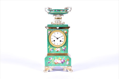 Lot 325 - A Louis XVI style French porcelain clock by...