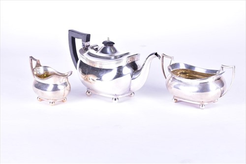 Lot 389 - A George V silver three piece tea set Chester...