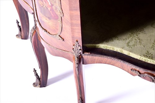 Lot 12 - A large Louis XV style serpentine front...