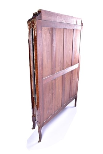 Lot 12 - A large Louis XV style serpentine front...