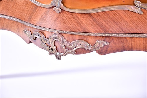 Lot 12 - A large Louis XV style serpentine front...