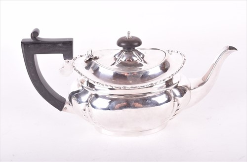 Lot 404 - An early 20th century silver bachelors tea pot...