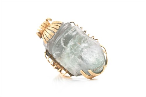 Lot 637 - An unusual yellow metal and fluorite ring set...