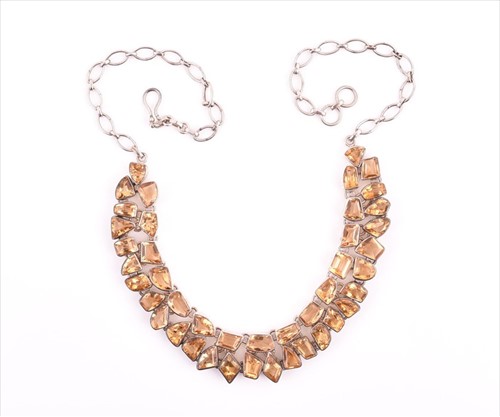 Lot 633 - A silver and citrineÂ bib necklace the...