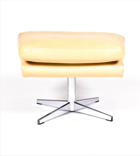 Lot 56 - A 1970s mushroom leather upholstered swivel...