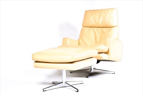 Lot 56 - A 1970s mushroom leather upholstered swivel...