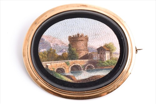 Lot 619 - A 19th century micro mosaic brooch depicting...