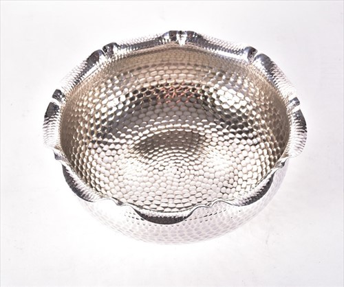 Lot 442 - A 20th century Continental hammered silver...