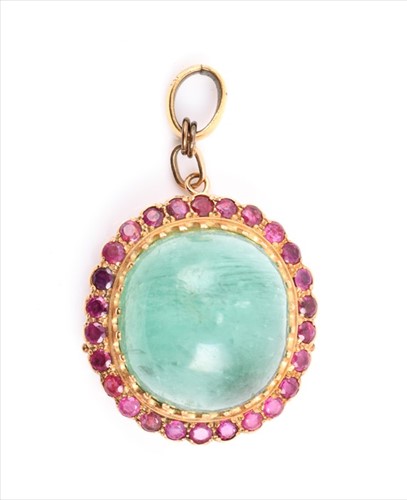 Lot 645 - An unusual yellow metal, ruby and green...