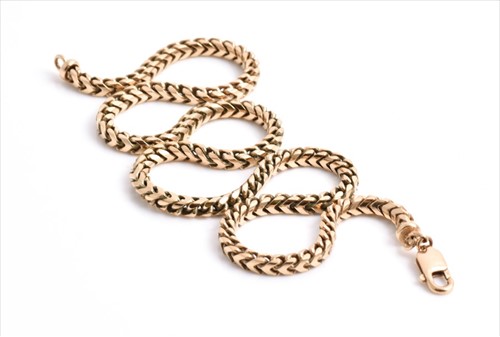 Lot 662 - A 9ct yellow gold necklace comprised of...