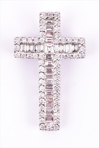 Lot 526 - An 18ct white gold and diamond cross pendant...
