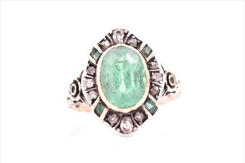 Lot 514 - A silver gilt, diamond, and emerald ring...