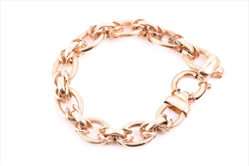 Lot 517 - A 9ct yellow gold fancy-linkÂ bracelet with...