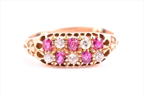 Lot 688 - A yellow metal, diamond, and ruby chequerboard...