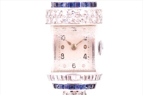 Lot 525 - An unusual diamond and sapphire ladies...