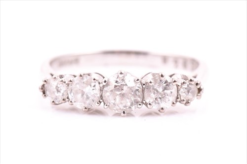 Lot 530 - An 18ct white gold and diamond ring set with...