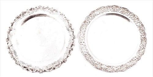 Lot 419 - A near pair of Continental silver plates (one...