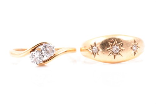 Lot 491 - An 18ct yellow gold and diamond crossover ring...