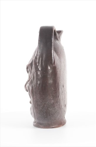 Lot 201 - An early 20th century Martin Brothers tall...