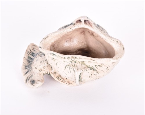 Lot 237 - A Martin Brothers spoonwarmer (or salt)...