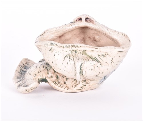 Lot 237 - A Martin Brothers spoonwarmer (or salt)...