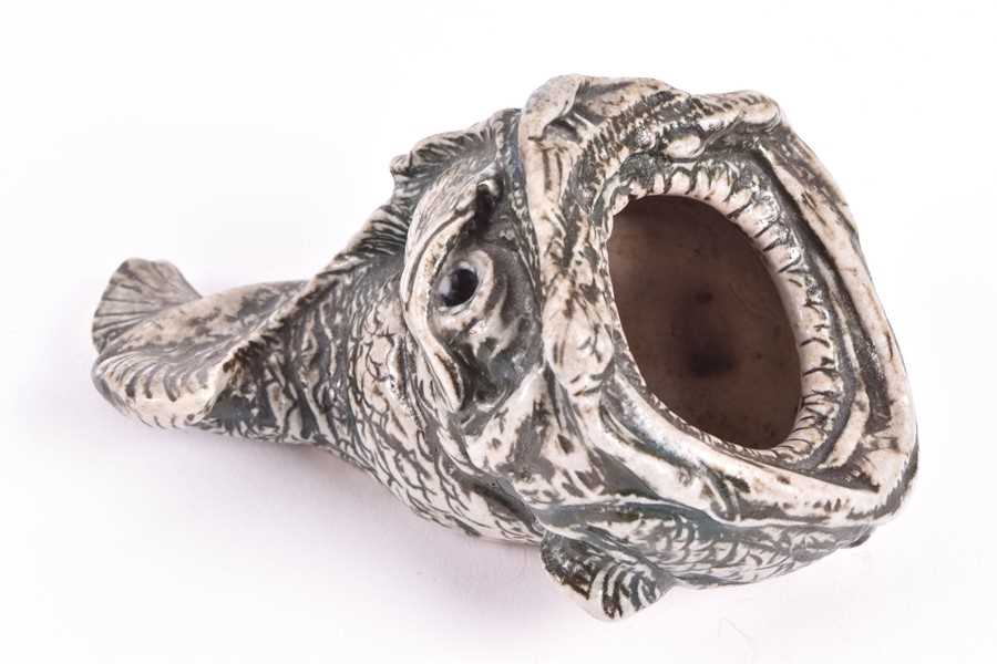 Lot 241 - A Martin Brothers spoonwarmer modelled as a...
