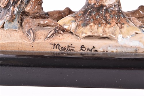Lot 225 - An early 20th century Martin Brothers triple...