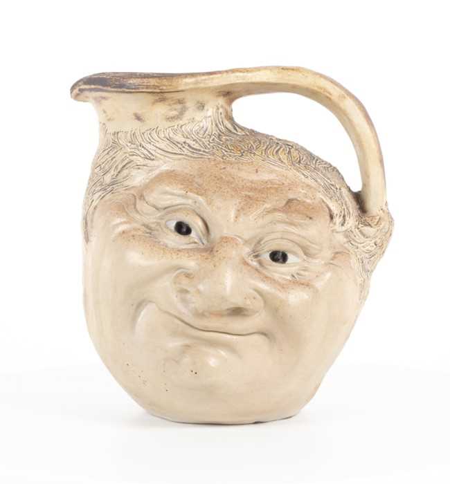 Lot 249 - A Martin Brothers large double-sided stoneware...