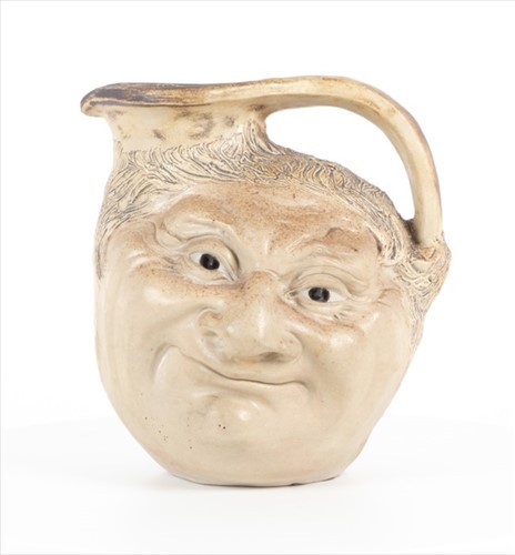 Lot 249 - A Martin Brothers large double-sided stoneware...