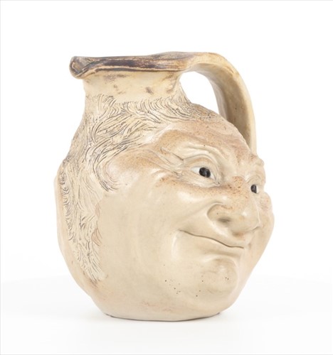 Lot 249 - A Martin Brothers large double-sided stoneware...