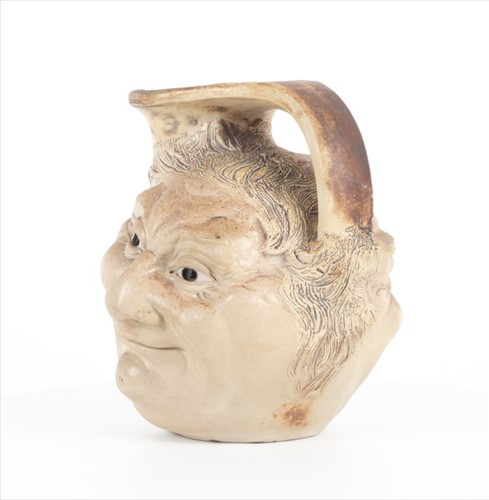 Lot 249 - A Martin Brothers large double-sided stoneware...