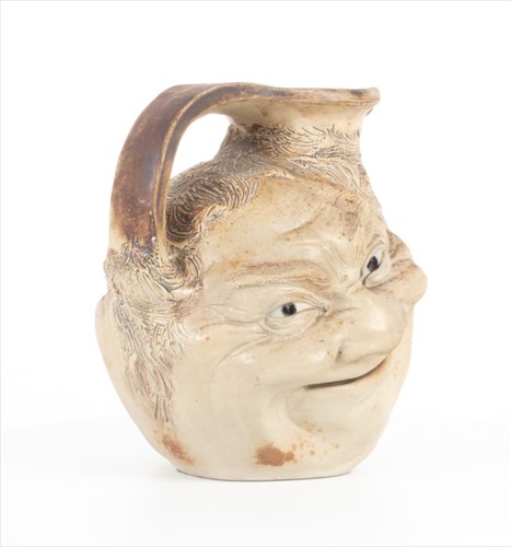 Lot 249 - A Martin Brothers large double-sided stoneware...