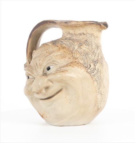 Lot 249 - A Martin Brothers large double-sided stoneware...