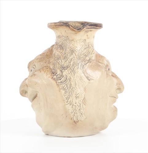 Lot 249 - A Martin Brothers large double-sided stoneware...