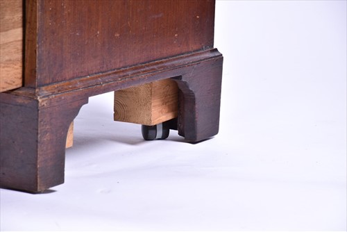 Lot 24 - A George III walnut bachelorâ€™s chestÂ  with...