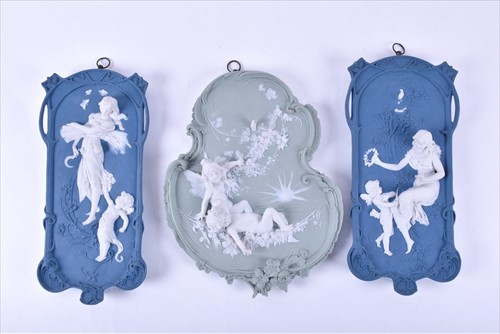 Lot 282 - A pair of blue and white relief jasperware...