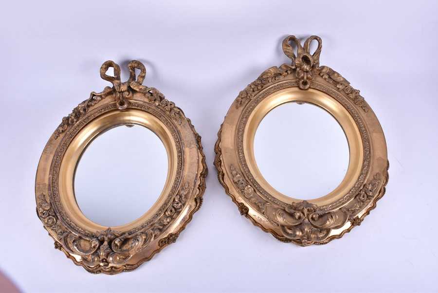 Lot 68 - A pair of late 19th/early 20th century gilt...