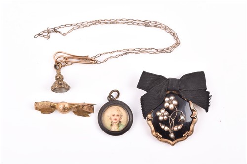 Lot 536 - A Victorian yellow metal, pearl, and enamel...