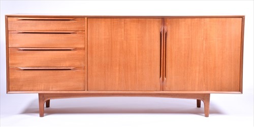 Lot 37 - A 1970s teak G-Plan style sideboard with two...