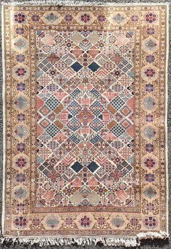 Lot 72 - A hand woven Persian Tabriz style rug of...