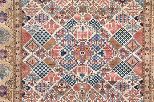 Lot 72 - A hand woven Persian Tabriz style rug of...