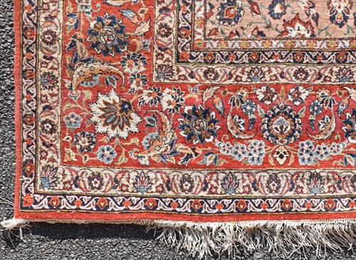 Lot 73 - A large Persian Tabriz style carpet with...