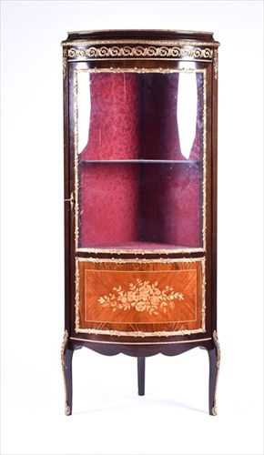 Lot 42 - A French Louis XV style corner vitrine cabinet...