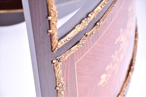 Lot 42 - A French Louis XV style corner vitrine cabinet...