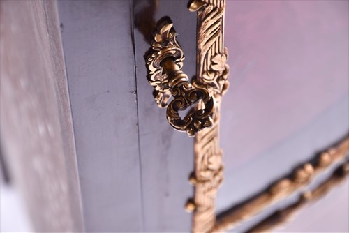 Lot 42 - A French Louis XV style corner vitrine cabinet...