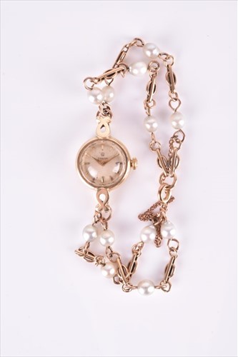 Lot 604 - A ladies Omega yellow gold cocktail watch with...